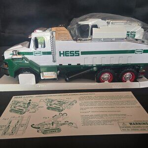 PRE-OWNED HESSS DUMP TRUCK AND LOADER